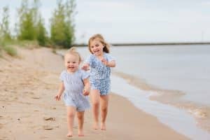 A beach family session in Muskegon Michigan photographed by Michigan photographer, Mae Photo Co.