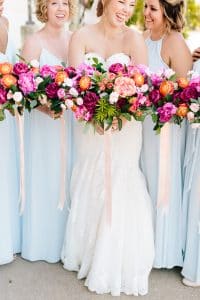 Colorful wedding bouquets with pink and orange.