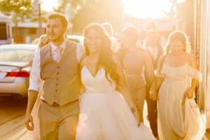 A candid golden hour portrait on the street downtown Grand Rapids captured by Mae Photo Co.