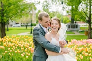 A bride and groom in Holland Michigan with tulips.