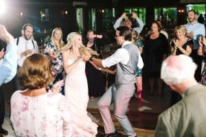 A bride and groom dancing at their reception at a barn wedding in Michigan.