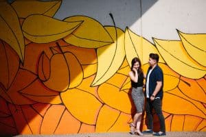 A Grand Rapids Engagement session showing off some of the city's street artwork.