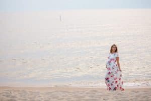 A floral maternity dress from Wren and Ivory photographed in Holland Michigan.