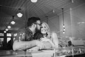 A lifestyle engagement session at Lyon Street Cafe in Grand Rapids, Michigan.