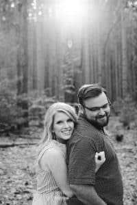 A romantic engagement session in Grand Haven Michigan at Rosy Mounds nature trails with a beautiful couple and beautiful sunlight.