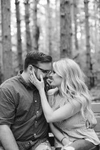 A romantic engagement session in Grand Haven Michigan at Rosy Mounds nature trails with a beautiful couple and beautiful sunlight.