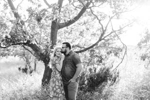 A beach engagement session in Grand Haven at Rosy Mounds.