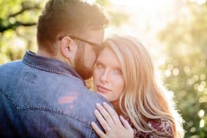 A beach engagement session in Grand Haven at Rosy Mounds.