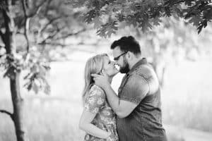 A beach engagement session in Grand Haven at Rosy Mounds.