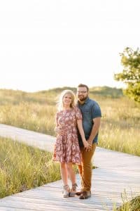A beach engagement session in Grand Haven at Rosy Mounds.