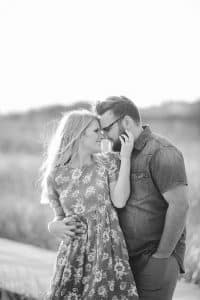 A beach engagement session in Grand Haven at Rosy Mounds.