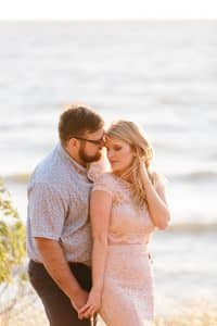 A beach engagement session in Grand Haven at Rosy Mounds.