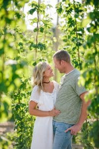 Michigan family lifestyle photography in a hop yard with the most adorable triplets. Great kids outfit ideas and a unique picture location idea.