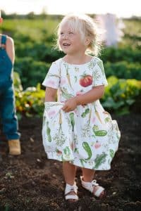 Family photography taken in the families vegetable garden.