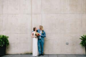 Alissa and Josh's wedding at the Grand Rapids Art Museum located downtown Grand Rapids. The GRAM is a beautiful timeless wedding venue.