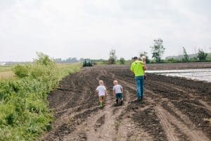 A day in the life session with toddler triplets working in the garden.