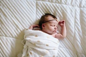 An in home lifestyle newborn session in Wayland, Michigan for baby Roselyn.