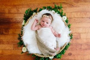 An in home lifestyle newborn session in Wayland, Michigan for baby Roselyn.