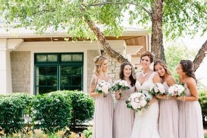 This blush pink Grand Rapids wedding was at Watermark Country Club. Florals and Design by Modern Day Floral and Events. Photography by Mae Photo Co.