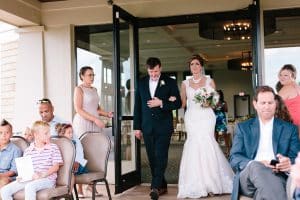 This blush pink Grand Rapids wedding was at Watermark Country Club. Florals and Design by Modern Day Floral and Events. Photography by Mae Photo Co.