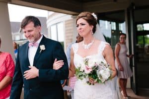 This blush pink Grand Rapids wedding was at Watermark Country Club. Florals and Design by Modern Day Floral and Events. Photography by Mae Photo Co.