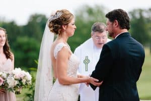 This blush pink Grand Rapids wedding was at Watermark Country Club. Florals and Design by Modern Day Floral and Events. Photography by Mae Photo Co.