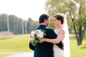 This blush pink Grand Rapids wedding was at Watermark Country Club. Florals and Design by Modern Day Floral and Events. Photography by Mae Photo Co.