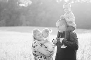 The Brock family had their Fall family pictures taken in the country in a soy bean field.