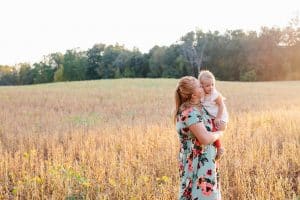The Brock family had their Fall family pictures taken in the country in a soy bean field.