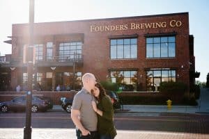 Beth and Trevor's favorite spot is Founders Brewing Co so it was only fitting to start out their lifestyle engagement session with a couple beers!