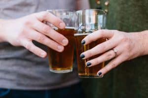 Beth and Trevor's favorite spot is Founders Brewing Co so it was only fitting to start out their lifestyle engagement session with a couple beers!