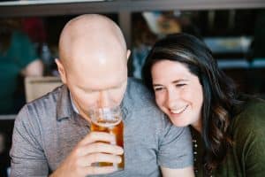 Beth and Trevor's favorite spot is Founders Brewing Co so it was only fitting to start out their lifestyle engagement session with a couple beers!
