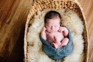 Camden Scot is 6 days old and had an in home newborn session with his family.