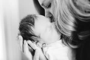Camden Scot is 6 days old and had an in home newborn session with his family.