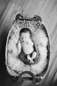 Camden Scot is 6 days old and had an in home newborn session with his family.