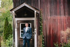 Cailly and Tyler had a rainy wedding day at Millcreek Barn in Michigan. Cailly wore a beautiful and unique wedding dress from Truvelle.