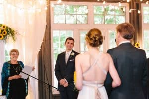 Cailly and Tyler had a rainy wedding day at Millcreek Barn in Michigan. Cailly wore a beautiful and unique wedding dress from Truvelle.