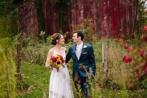 Cailly and Tyler had a rainy wedding day at Millcreek Barn in Michigan. Cailly wore a beautiful and unique wedding dress from Truvelle.