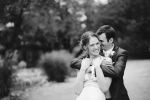 Cailly and Tyler had a rainy wedding day at Millcreek Barn in Michigan. Cailly wore a beautiful and unique wedding dress from Truvelle.