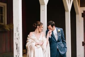 Cailly and Tyler had a rainy wedding day at Millcreek Barn in Michigan. Cailly wore a beautiful and unique wedding dress from Truvelle.