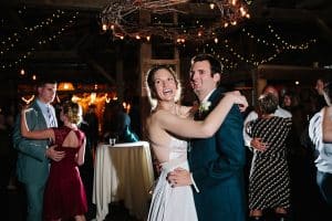 Cailly and Tyler had a rainy wedding day at Millcreek Barn in Michigan. Cailly wore a beautiful and unique wedding dress from Truvelle.