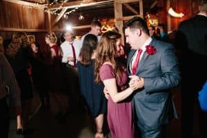 Cailly and Tyler had a rainy wedding day at Millcreek Barn in Michigan. Cailly wore a beautiful and unique wedding dress from Truvelle.
