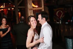 Cailly and Tyler had a rainy wedding day at Millcreek Barn in Michigan. Cailly wore a beautiful and unique wedding dress from Truvelle.