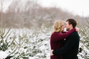 The first Michigan snowfall was the perfect backdrop for this engagement session in Grand Rapids at Vormittag Tree Farm.