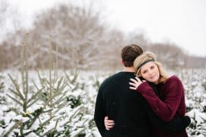 The first Michigan snowfall was the perfect backdrop for this engagement session in Grand Rapids at Vormittag Tree Farm.