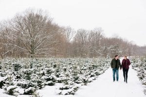 The first Michigan snowfall was the perfect backdrop for this engagement session in Grand Rapids at Vormittag Tree Farm.