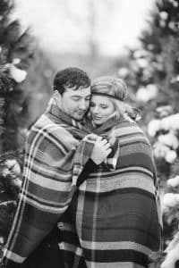The first Michigan snowfall was the perfect backdrop for this engagement session in Grand Rapids at Vormittag Tree Farm.