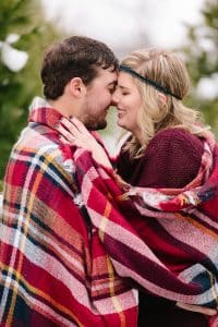 The first Michigan snowfall was the perfect backdrop for this engagement session in Grand Rapids at Vormittag Tree Farm.