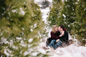 The first Michigan snowfall was the perfect backdrop for this engagement session in Grand Rapids at Vormittag Tree Farm.