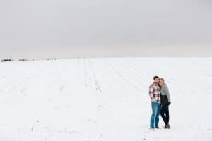 The first Michigan snowfall was the perfect backdrop for this engagement session in Grand Rapids at Vormittag Tree Farm.